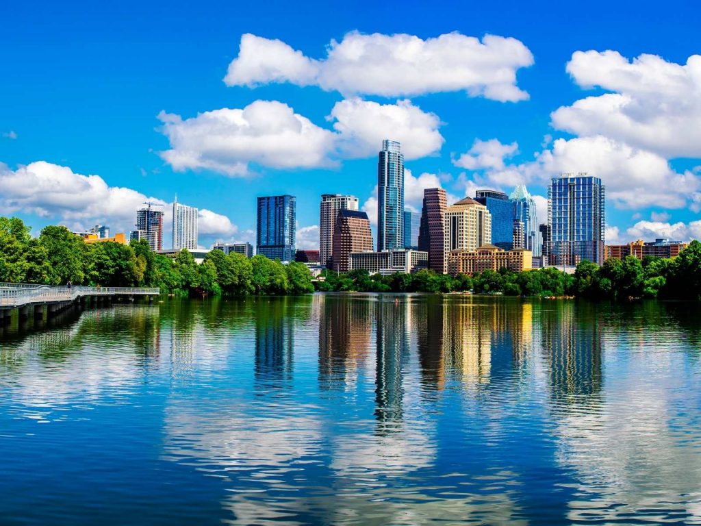 Austin skyline reflecting in water