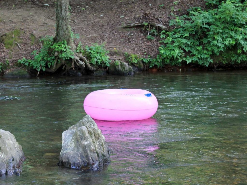 tube floating in river