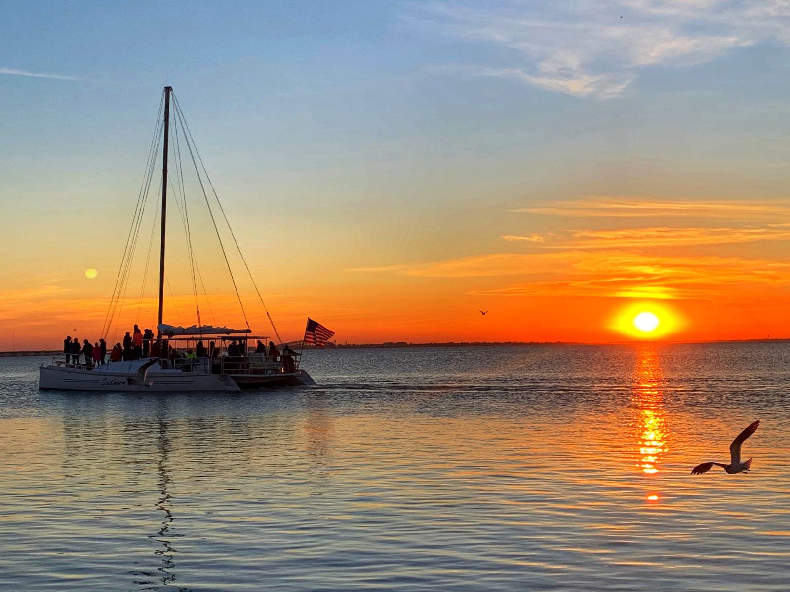 sunset and boat South Padre Island spring break